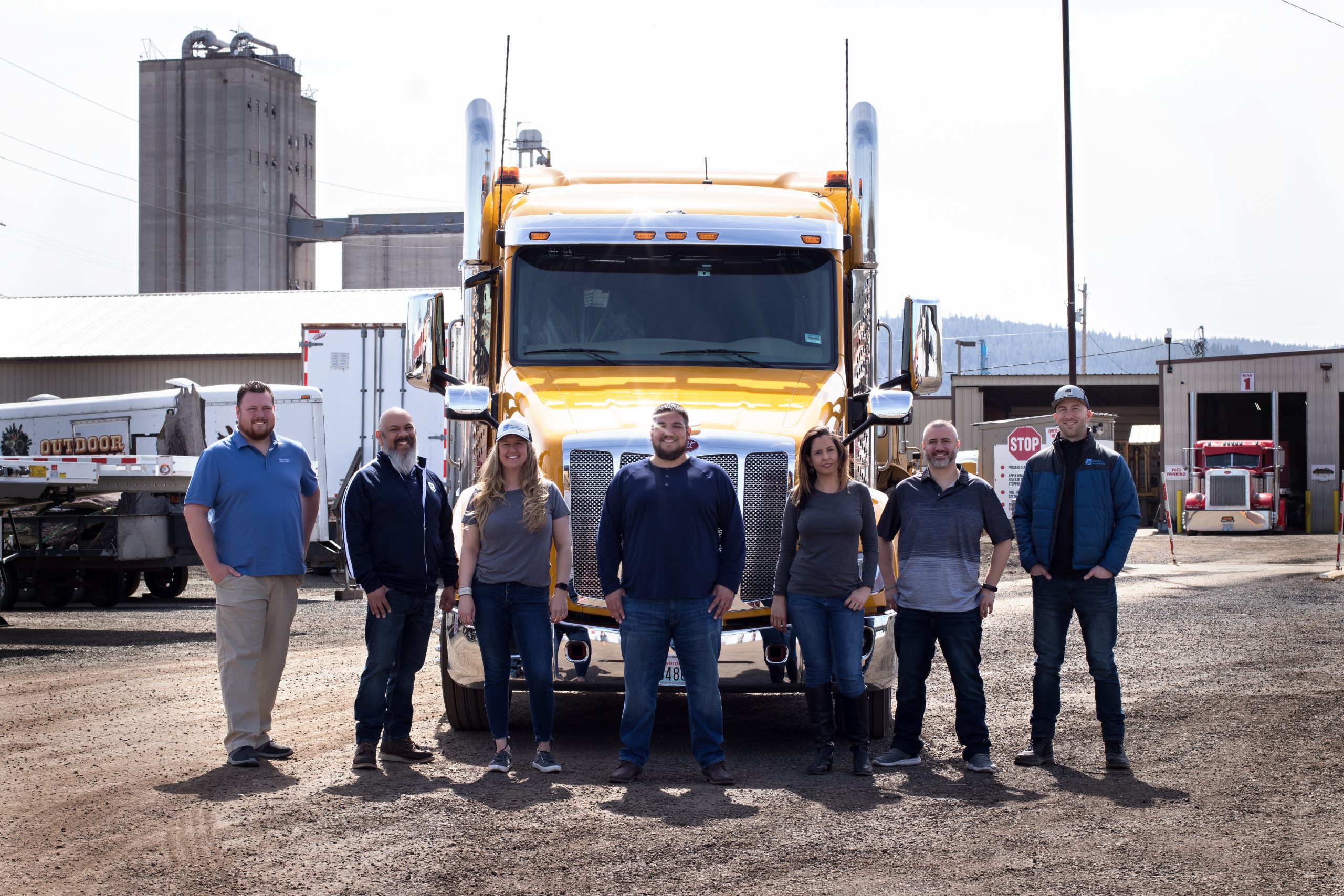 Trucking Team Photo in front of Semi