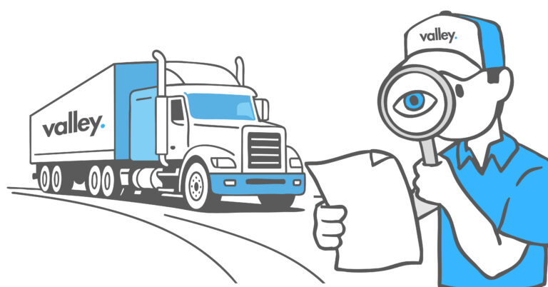 Illustration showing Predictive Maintenance in Trucking with a Valley truck inspected by a fleet manager using a magnifying glass.