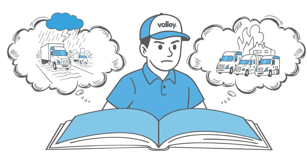 Logistics team coordinating emergency response in control room. Valley Trucking Insurance