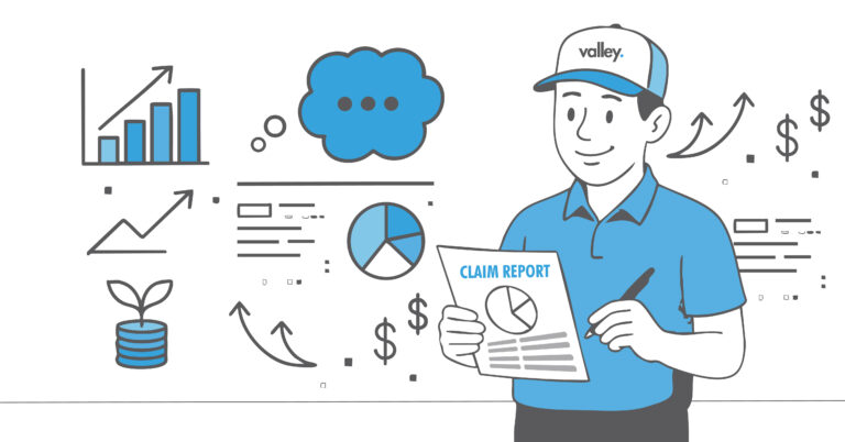 Insurance agent reviewing trucking loss run report with fleet manager