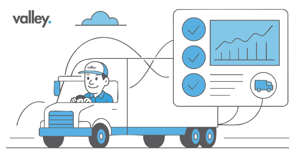 Logistics team reviewing shipment visibility on digital dashboard